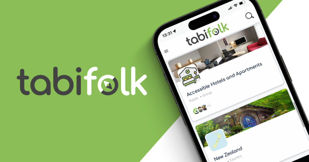 Tabi-Folk logo with a mobile phone showing the website on screen.