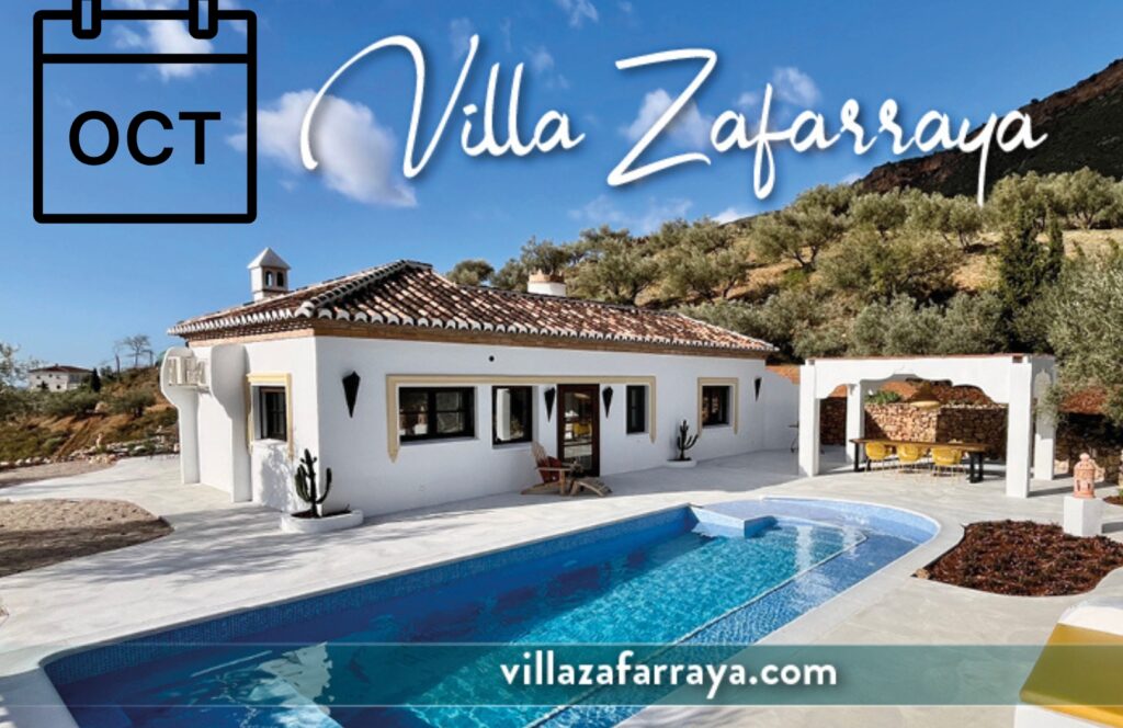 A scenic view of Villa Zafarraya, a white Spanish-style villa with a tiled roof, surrounded by olive trees and hills under a clear blue sky. The property features a private swimming pool, sun loungers, and a shaded outdoor dining area. Overlaid text reads “Villa Zafarraya” in elegant script, with a calendar icon marked “OCT” in the top left and the website address “villazafarraya.com” at the bottom.