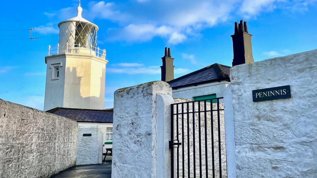 The Lighthouse and connecting building at Lizards Point, all arre painted white.