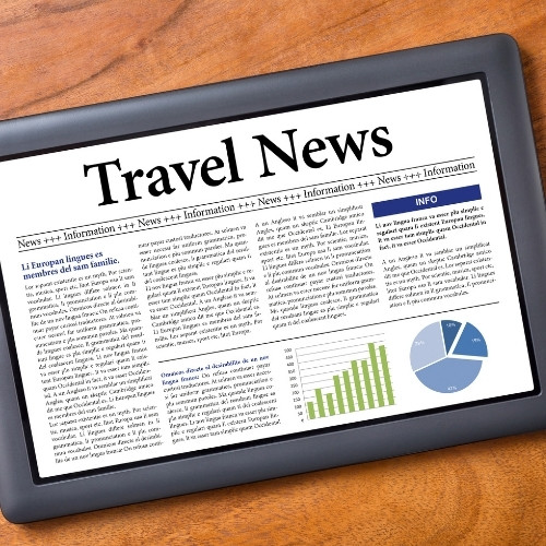 Tablet screen displaying a digital newspaper with the headline 'Travel News' along with articles, charts, and graphs.