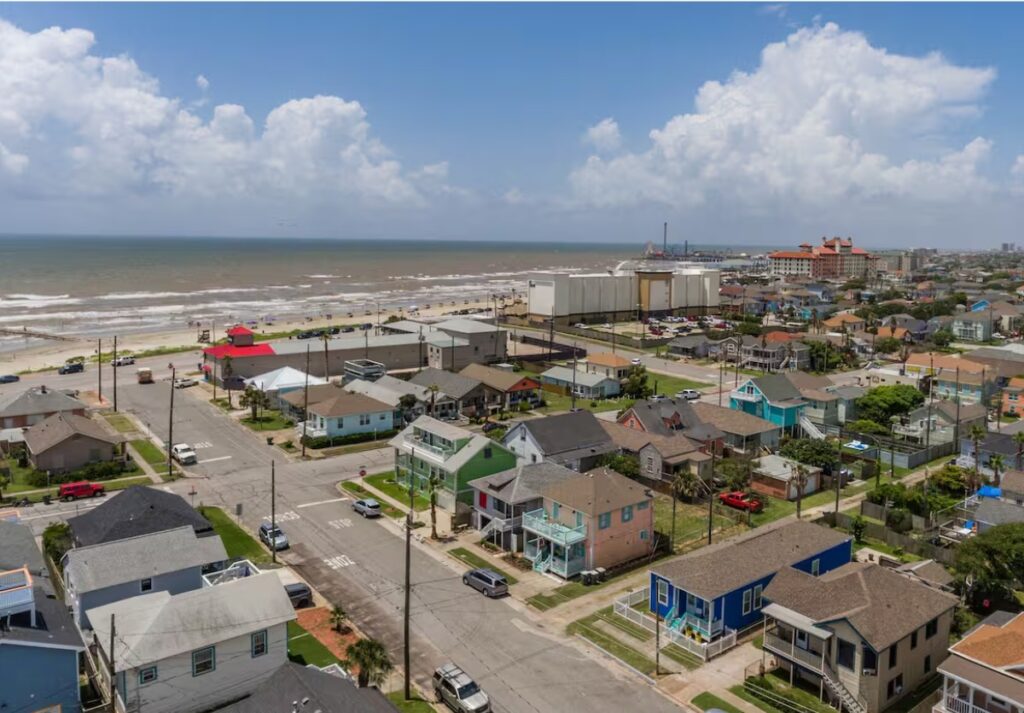 Aerial view of Galveston beach neighborhood near accessible rental home.