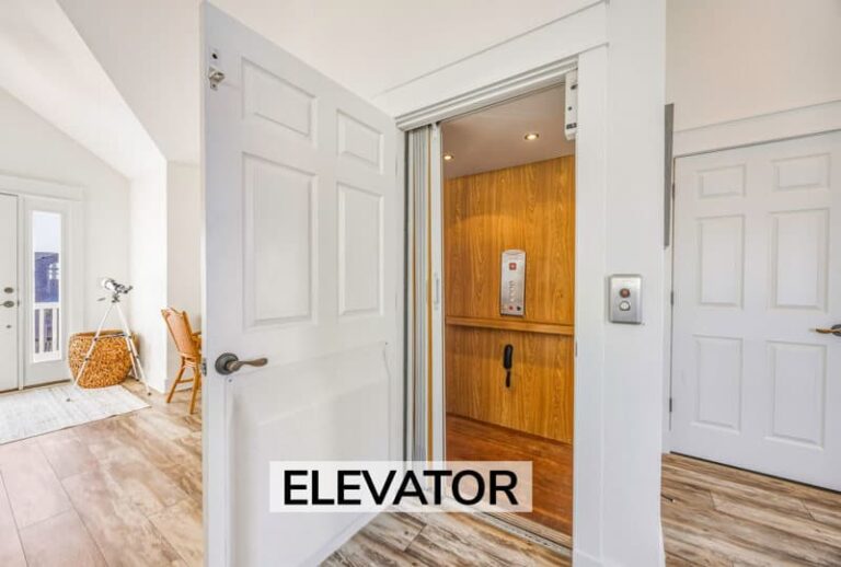 Interior view of the private residential elevator with wood-paneled walls and accessible control panel, providing easy transit between all floors of the house.