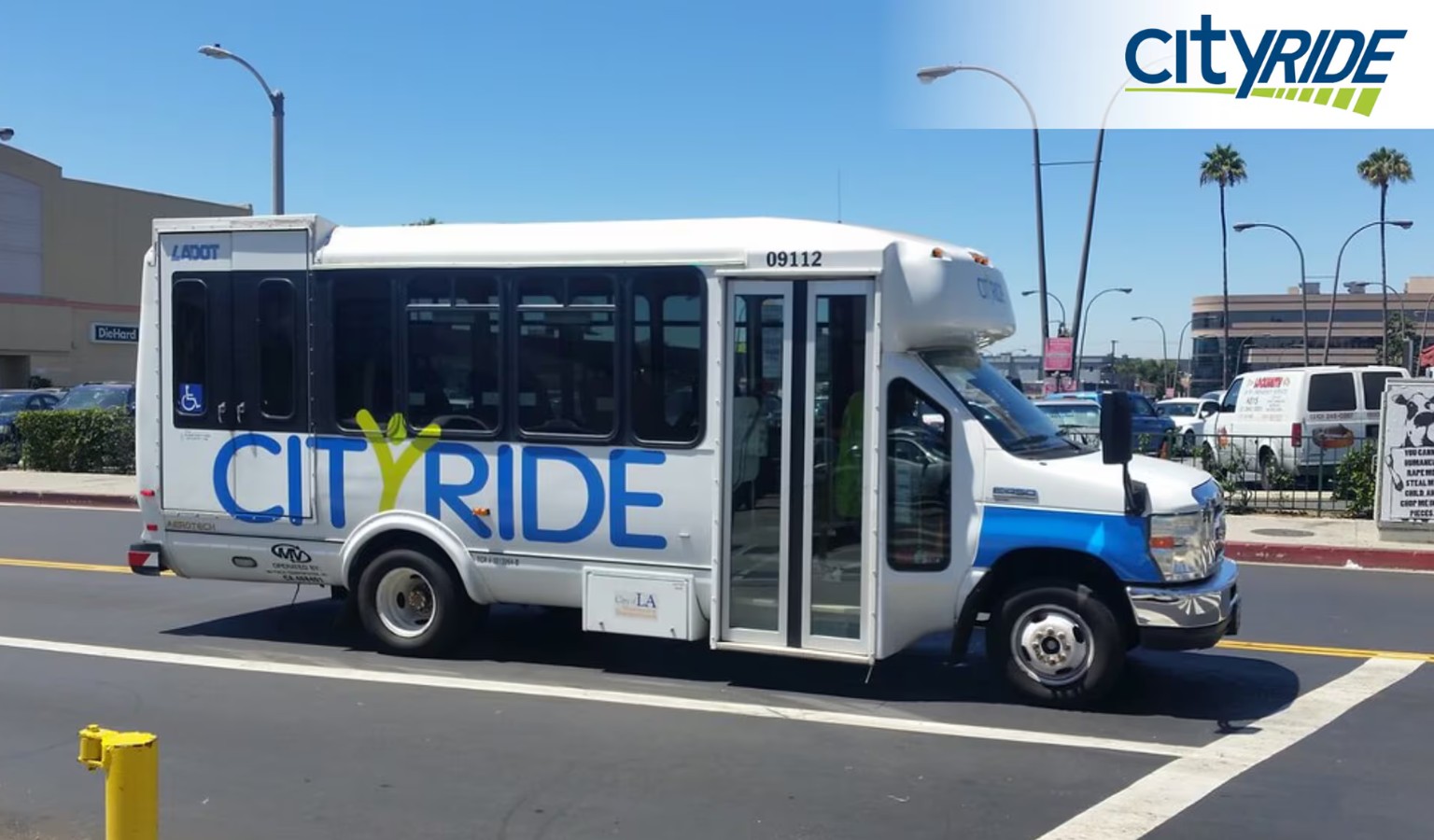 LADOT CityRide accessible minibus with wheelchair symbol on a Los Angeles street – accessible transport guide to LA