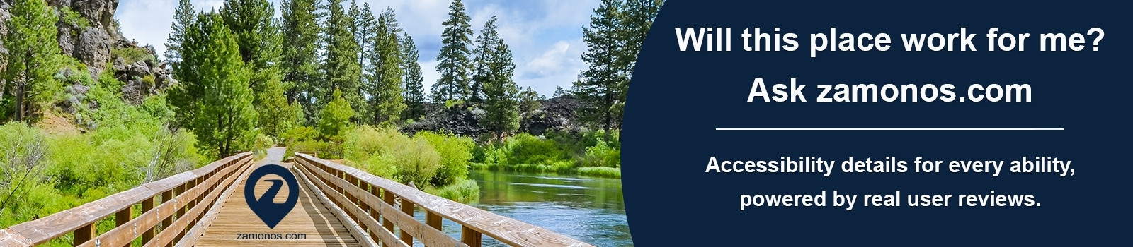 A wooden boardwalk trail leads through a lush green forest of pine trees toward a calm river, with rocky outcrops visible in the background. Text overlay reads: 'Will this place work for me? Ask zamonos.com. Accessibility details for every ability, powered by real user reviews.' Zamonos.com logo shown on the boardwalk.